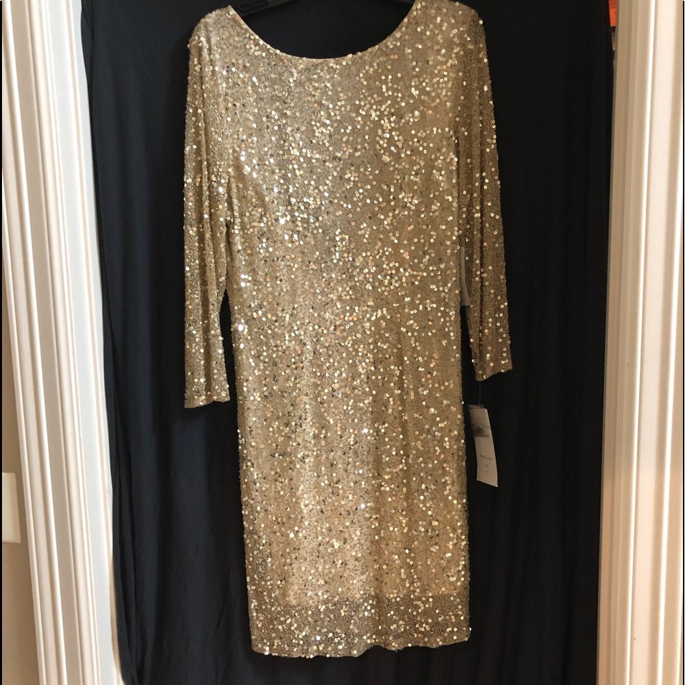 Gold Sequined dress.